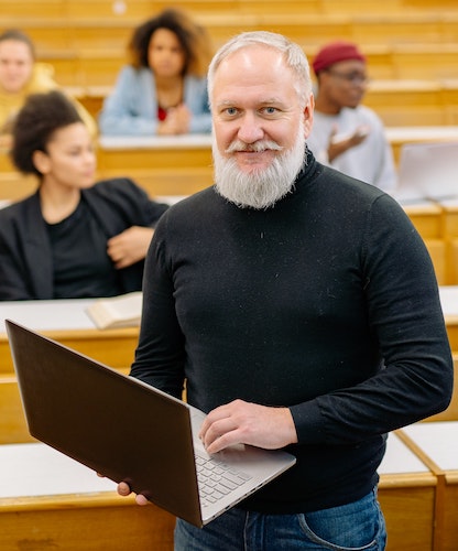 Professor with beard and computer