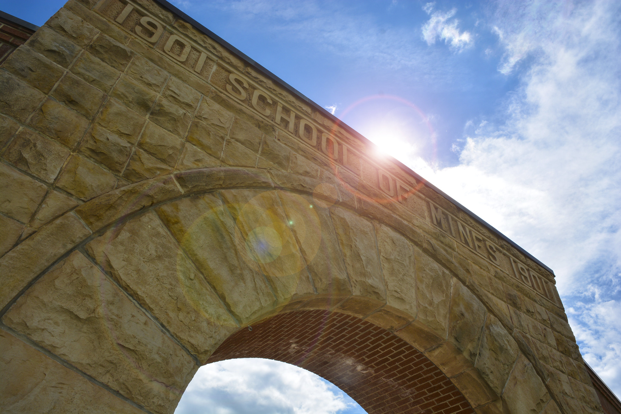 Campus arch with lens flare