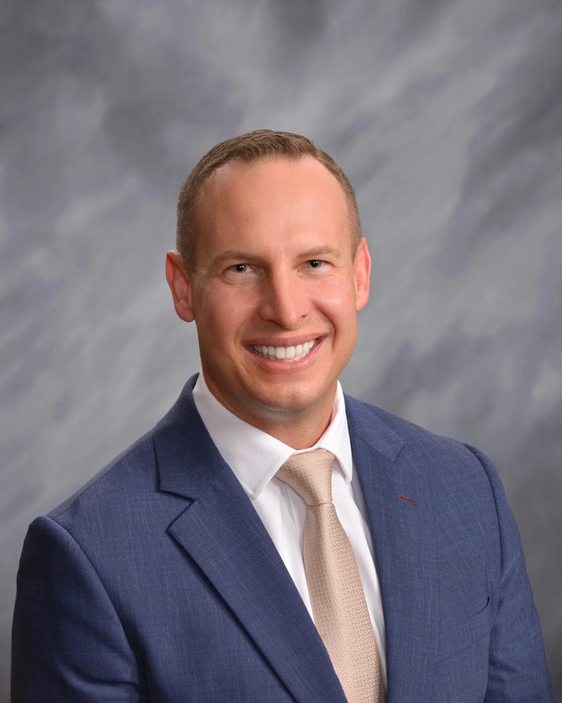 Headshot of Jason Simmons.