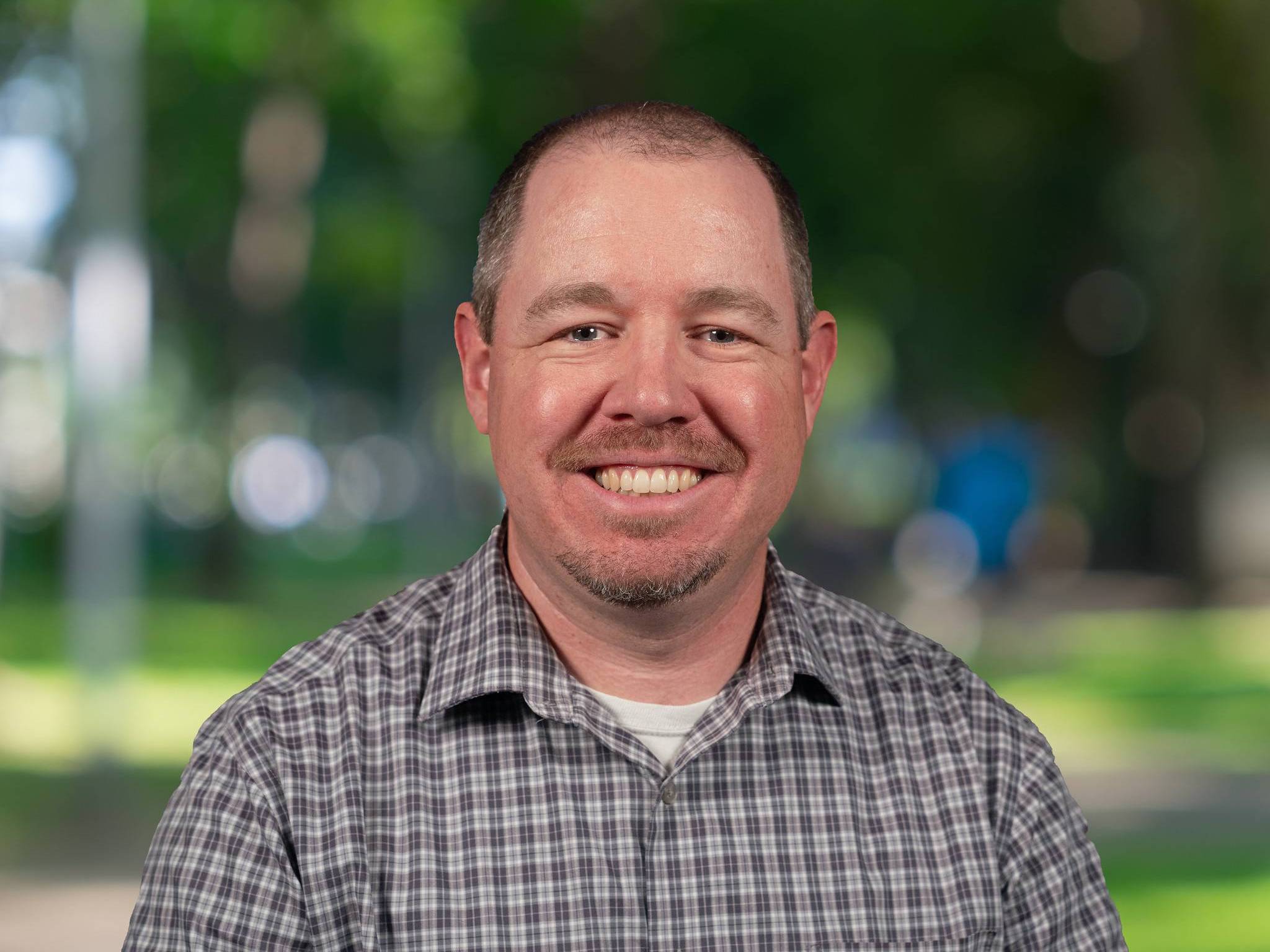 Headshot of Adam French