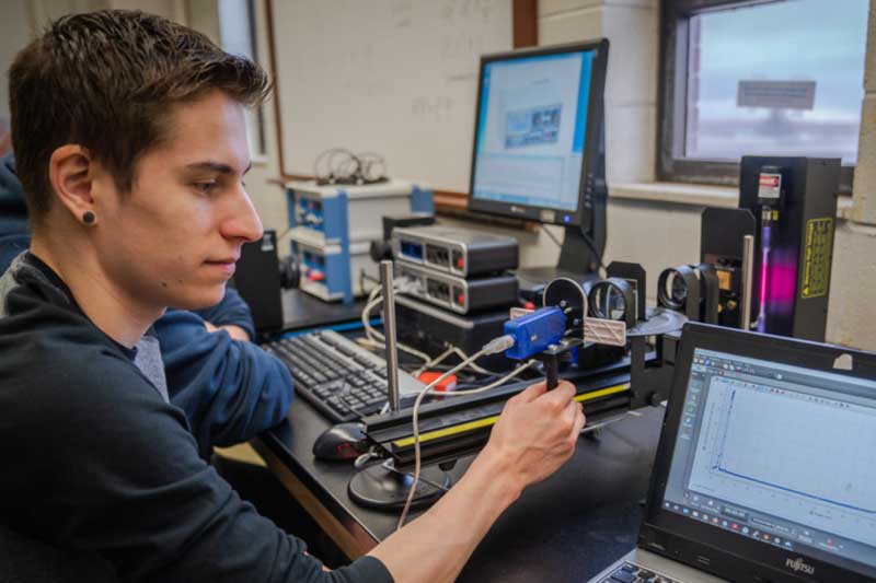 Two people experimenting on a table