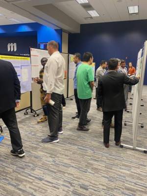 The conference featured student posters and oral presentations on char-based products.